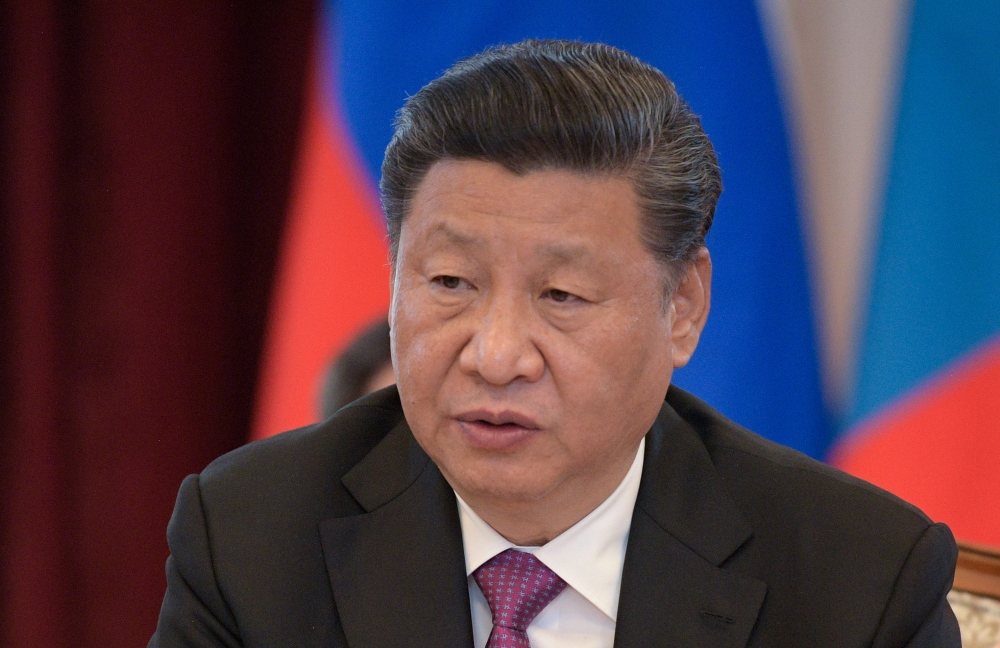 China’s President Xi Jinping attends a meeting with Russia’s President Vladimir Putin (not pictured) and Mongolia's President Khaltmaagiin Battulga (not pictured) on the sidelines of the Shanghai Cooperation Organisation (SCO) summit in Bishkek, Kyrgyzsta