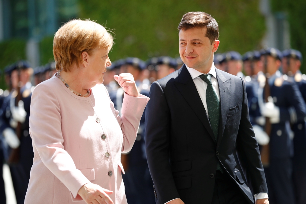German Chancellor Angela Merkel and Ukrainian President Volodymyr Zelenskiy meet at the Chancellery in Berlin, Germany, June 18, 2019. REUTERS/Hannibal Hanschke