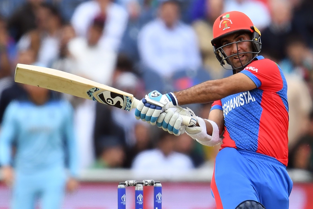 Afghanistan's Hashmatullah Shahidi plays a shot during the 2019 Cricket World Cup group stage match between England and Afghanistan at Old Trafford in Manchester, northwest England, on June 18, 2019. AFP / Dibyangshu Sarkar 