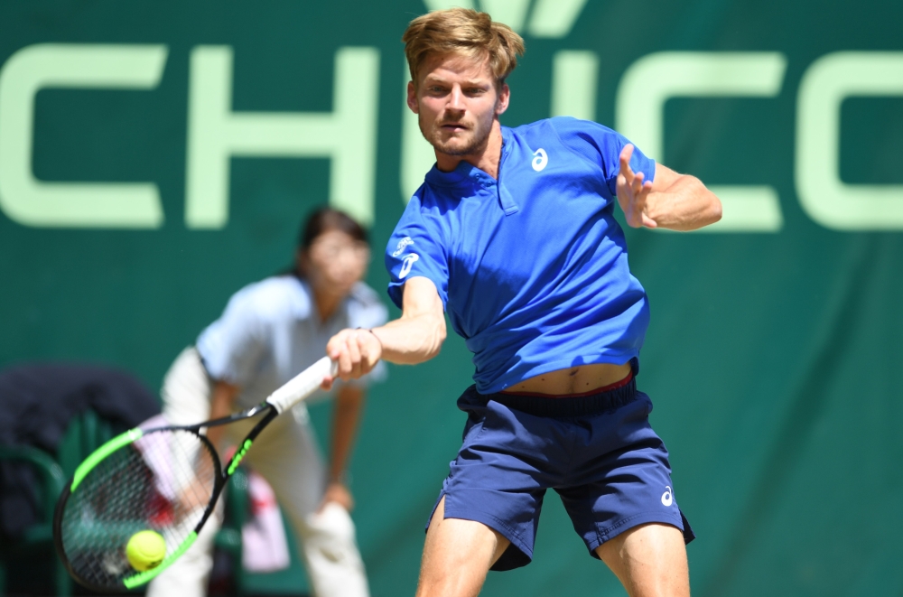 David Goffin from Belgium returns the ball during his match against Matteo Berrettini from Italy at the ATP tennis tournament in Halle, western Germany, on June 22, 2019. / AFP / CARMEN JASPERSEN