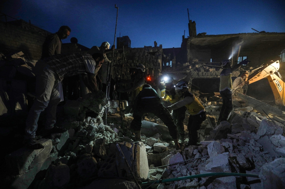 Members of the Syrian Civil Defence, also known as the 