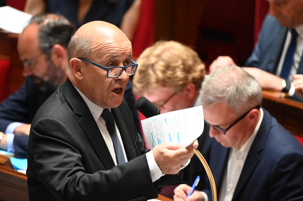 French Foreign Affairs Minister Jean-Yves Le Drian speaks during a session of questions to the government at the National Assembly in Paris on June 25, 2019. / AFP / DOMINIQUE FAGET