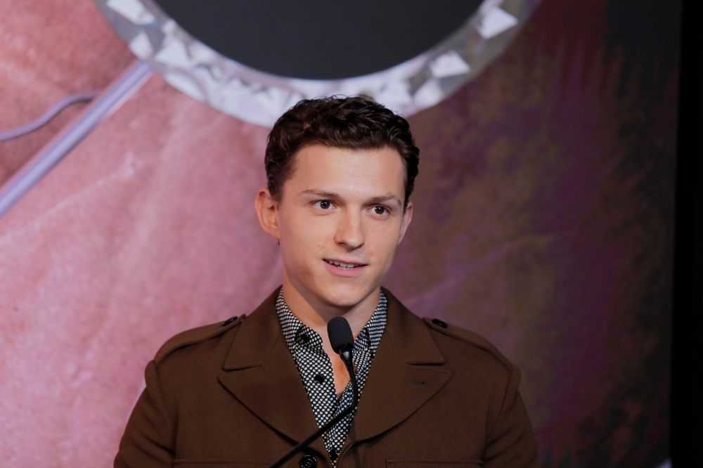 Actor Tom Holland speaks before a ceremony to light the top of the Empire State Building to promote the film, Spider-Man: Far From Home in New York, U.S., June 24, 2019. REUTERS/Lucas Jackson