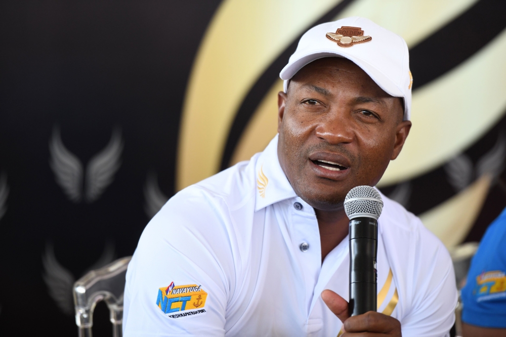 (FILES) In this file photo taken on November 10, 2018, former West Indies cricketer and golfer Brian Lara addresses a press conference during the fourth edition of the Krishnapatnam Port Golden Eagles Golf Championship at Boulder Hills in Hyderabad. AFP /