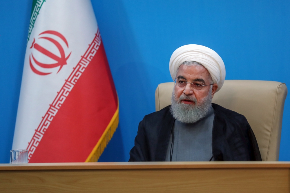President Hassan Rouhani attending a meeting with ministers broadcast live on TV in Tehran on June 25, 2019. AFP 