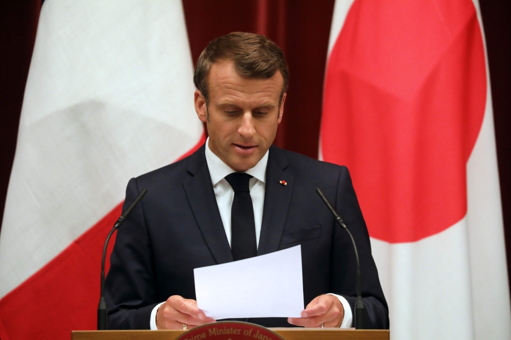 France's President Emmanuel Macron speaks during a joint press conference with Japan's Prime Minister Shinzo Abe in Tokyo on June 26, 2019. / AFP /  ludovic MARIN
