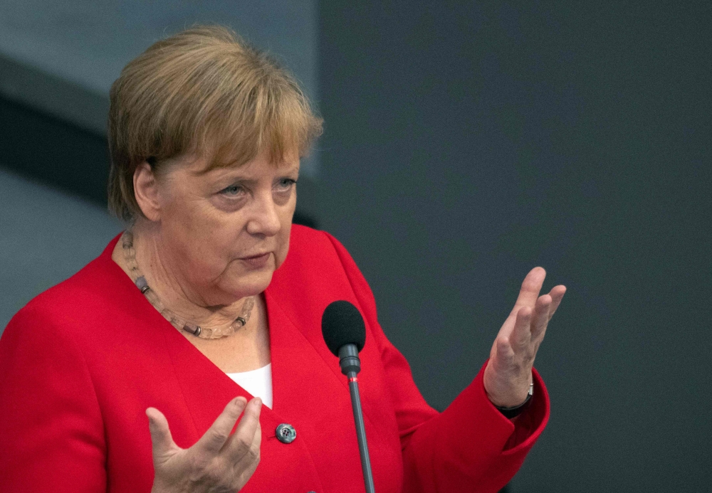 German Chancellor Angela Merkel answers parliamentarians’ questions at the Bundestag in Berlin on June 26, 2019.  AFP / Ralf Hirschberger