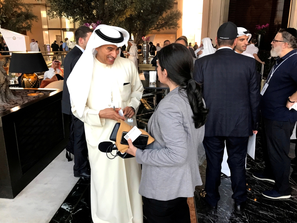 Emirati businessman Mohamed Alabbar, chairman of Dubai-based Emaar Properties, talks to an Israeli radio journalist at the 