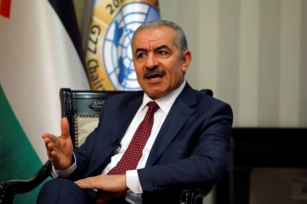 Palestinian Prime Minister Mohammad Shtayyeh gestures during an interview with Reuters in his office in Ramallah, in the Israeli-occupied West Bank, June 27, 2019. Reuters/Raneen Sawafta