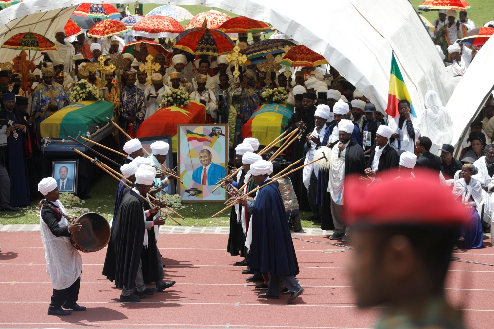The coffins of Amhara president Ambachew Mekonnen and two other officials who where killed in an attack are seen during a funeral ceremony in the town of Bahir Dar, Amhara region, Ethiopia June 26, 2019. Reuters/Baz Ratner 