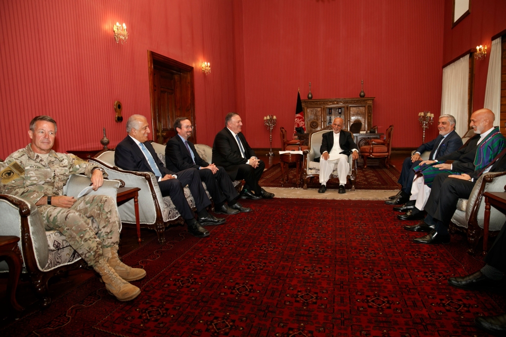 Secretary of State Mike Pompeo meets with, from left, Resolute Support NATO Base Commander Gen. Austin Scott Miller, Afghanistan Envoy Zalmay Khalilzad, U.S. Ambassador to Afghanistan John Bass, Pompeo, Afghan President Ashraf Ghani, Afghan Chief Executiv