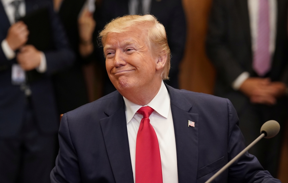 U.S. President Donald Trump smiles during a meeting with South Korean President Moon Jae-in at the Blue House in Seoul, South Korea, June 30, 2019. REUTERS/Kevin Lamarque
