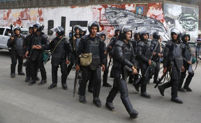 Egypt riot police in Mohamed Mahmoud street during third anniversary of clashes near Tahrir square, Cairo, Nov 19, 2014. Reuters/Amr Abdallah Dalsh