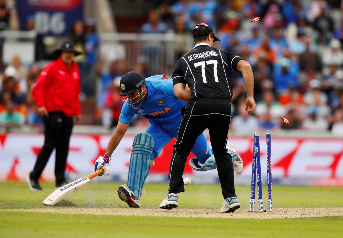  India's MS Dhoni loses his wicket. (Action Images via Reuters/Jason Cairnduff) 
