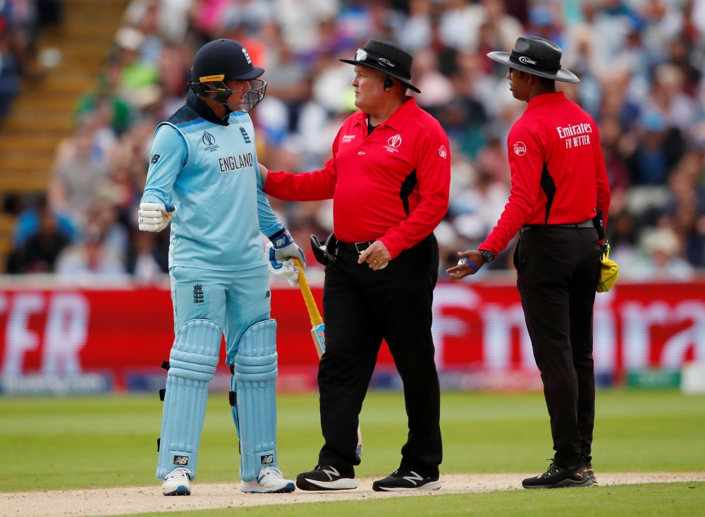 England's Jason Roy speaks with umpire Handunnettige Dharmasena and Marais Erasmus Action Images via Reuters/Andrew Boyers
 
