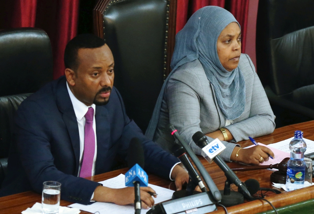 FILE PHOTO: Abiy Ahmed newly elected PM of Ethiopia with parliament speaker Muferiat Kamil inside the House of Peoples Representatives in Addis Ababa, July 6, 2018. Reuters/Tiksa Negeri