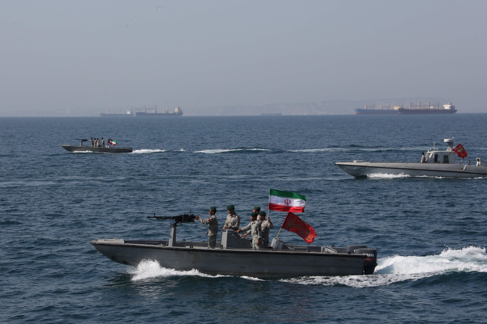 In this file photo taken on April 30, 2019 Iranian soldiers take part in the National Persian Gulf day in the Strait of Hormuz. AFP / Atta Kenare