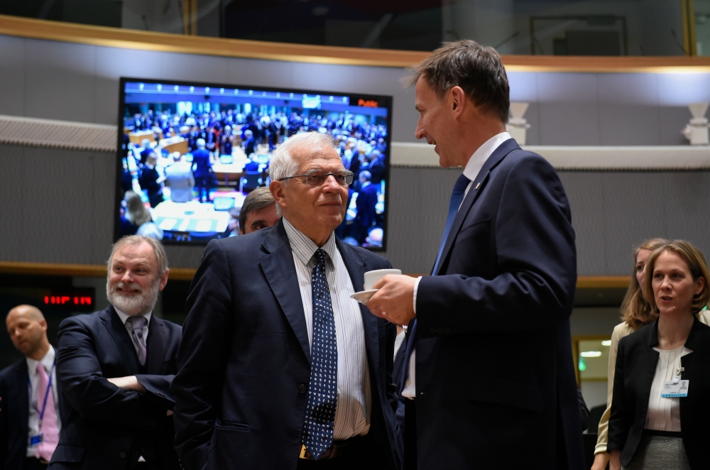 Spain's Minister of Foreign Affairs Josep Borrell (L) welcomes Britan's Foreign Secretary Jeremy Hunt (R) during a Foreign Affairs meeting at the EU headquarters in Brussels on July 15, 2019. (AFP / JOHN THYS)