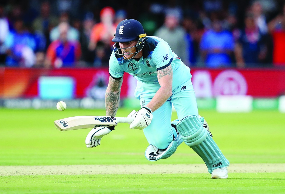 The ball deflects off England’s Ben  Stokes before rolling to the boundary during the World Cup final on Sunday. (Action Images via Reuters/Peter Cziborra) 