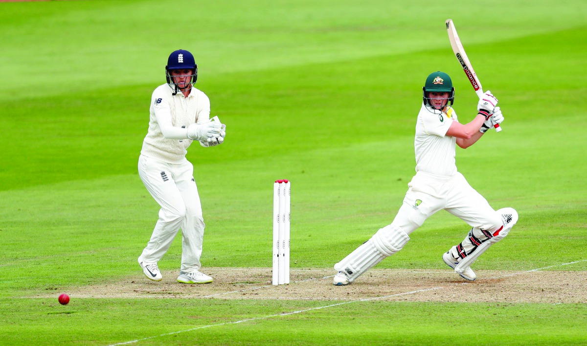 Australia’s Meg Lanning in action as England’s Sarah Taylor looks on during an Ashes women’s Test match at The Coopers Associates County Ground, Taunton, Britain. (Action Images via Reuters/Peter Cziborra)  