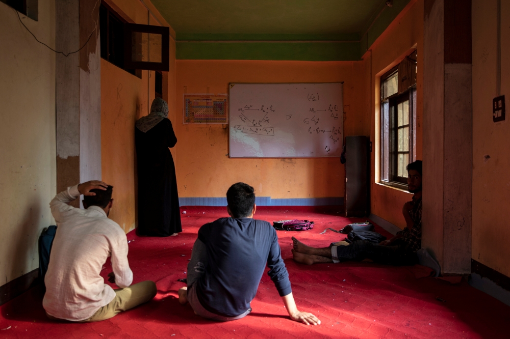 Students of Rizwan Pandit, a school principal who was allegedly killed in police custody, are seen inside the classroom of a coaching centre run by him in Awantipora, south of Srinagar, July 9, 2019. Reuters/Danish Siddiqui