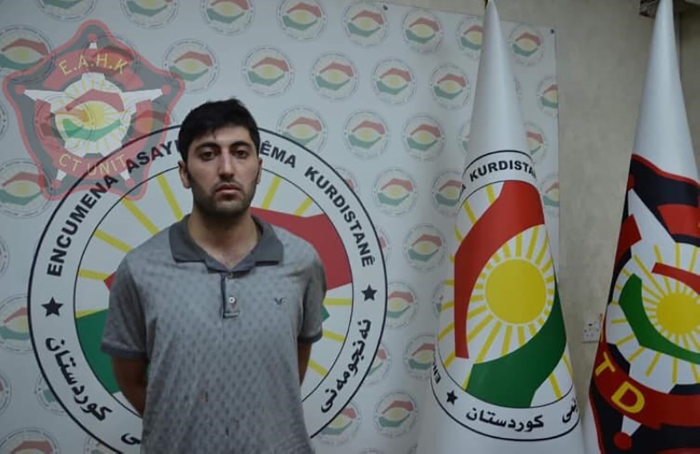 This handout photograph released by the Kurdistan Region Counterterrorism Unit on July 20, 2019, shows 27-year-old Mazloum Dag, a Kurdish man from Turkey who was identified as the suspected shooter in the murder of a Turkish diplomat, standing at an undis
