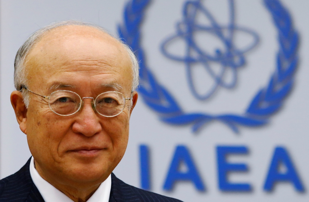 File photo of International Atomic Energy Agency (IAEA) Director General Yukiya Amano smiles as he waits for a board of governors meeting to begin at the IAEA headquarters in Vienna, Austria June 6, 2016. REUTERS/Heinz-Peter Bader/File Photo