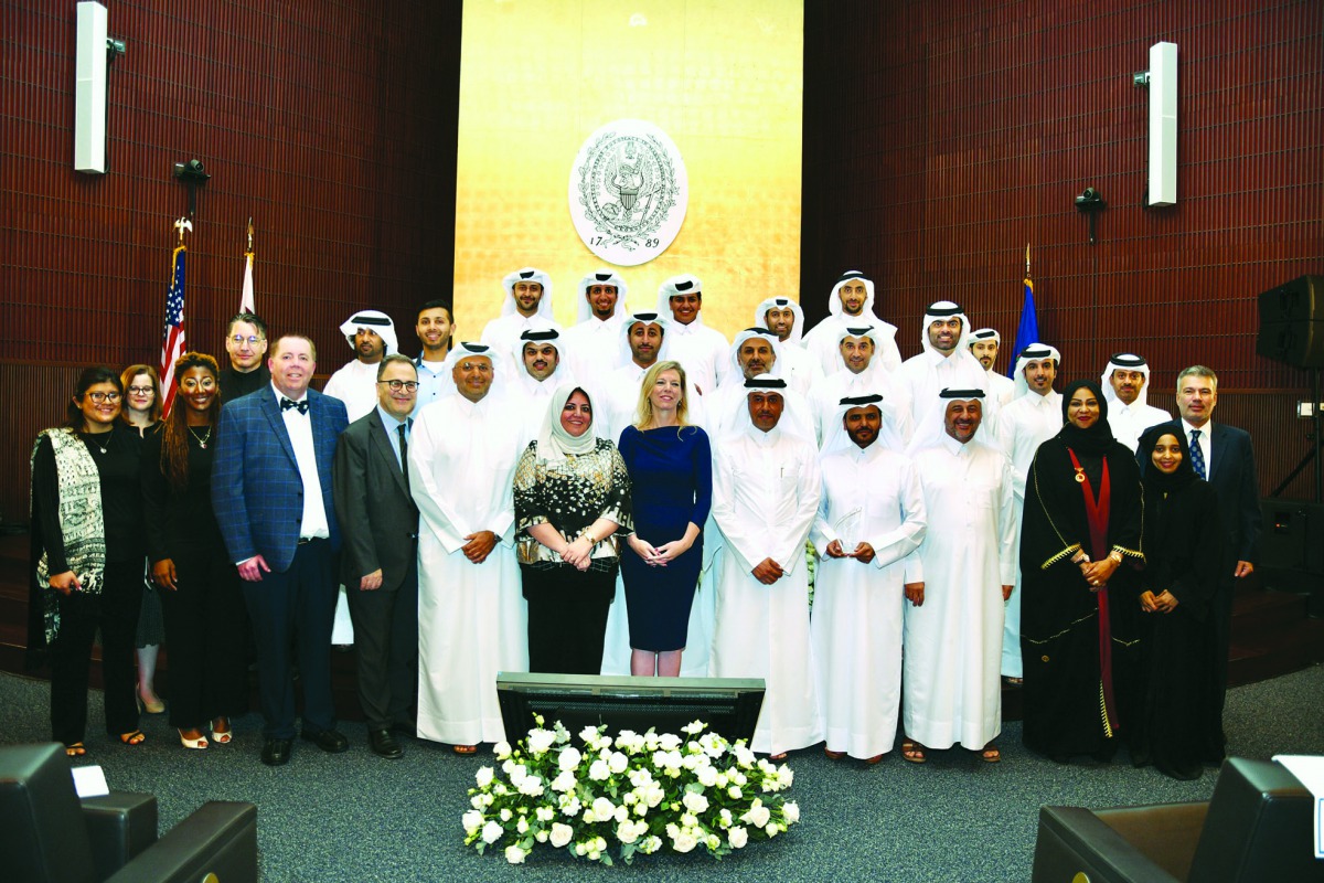 Officials and graduates of the International Executive Master’s in Emergency and Disaster Management (IEDM) degree programme pose for a group photo at Georgetown University in Qatar. 