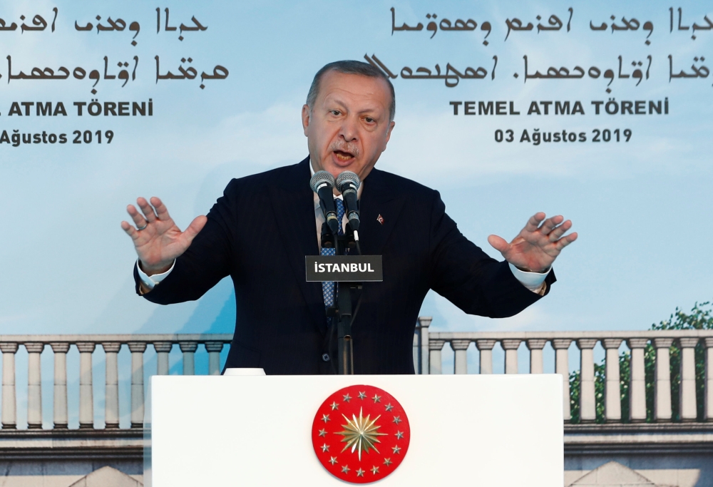 Turkish President Tayyip Erdogan speaks during the groundbreaking ceremony of the Mor Efrem Syriac Orthodox Church in Istanbul, Turkey, August 3, 2019. REUTERS/Murad Sezer