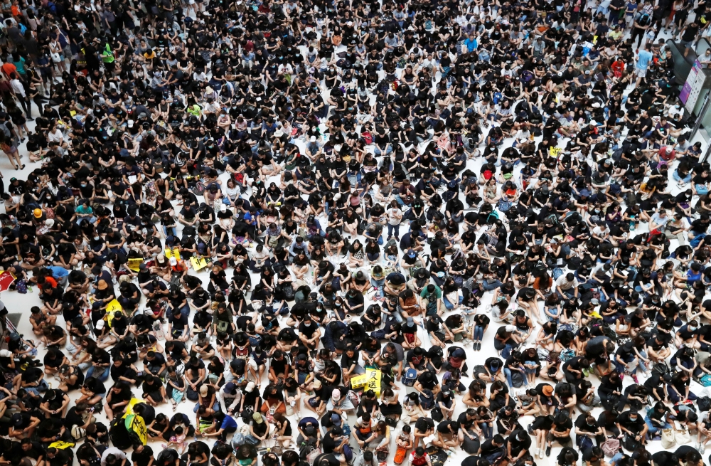 Demonstrators attend a rally to support the city-wide strike and to call for democratic reforms at New Town Plaza shopping mall in Hong Kong, China, August 5, 2019. REUTERS/Kim Kyung-Hoon
