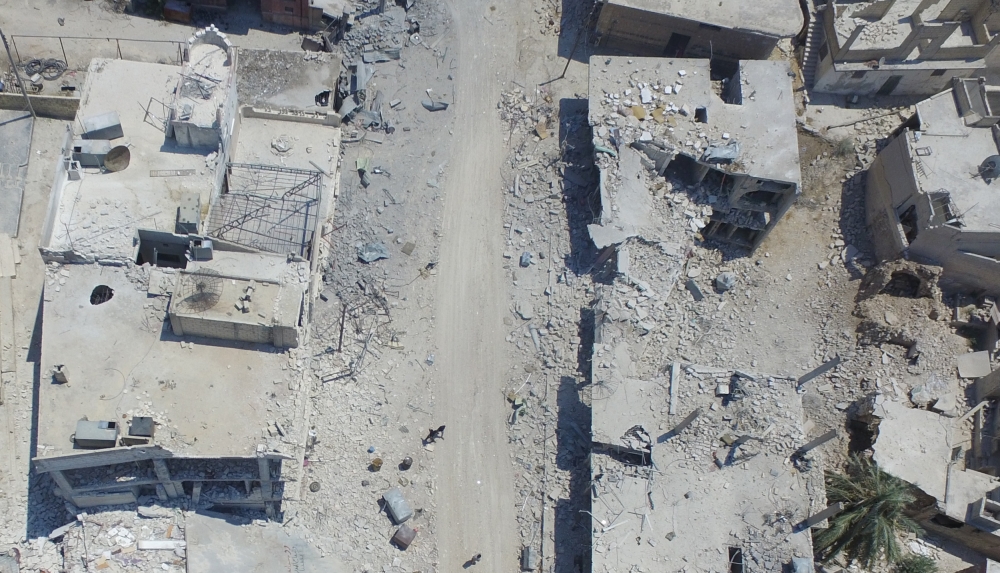 An aerial view of the damaged buildings after the attacks of Assad regime and its supporters in the de-escalation zone of Khan Shaykhun town of Syria's Idlib on August 03, 2019. Izeddin Idilbi - Anadolu