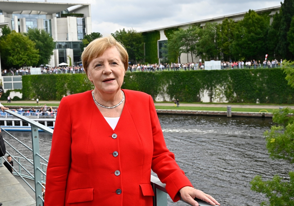 German Chancellor Angela Merkel poses for media at the Chancellery during the German Federal Government open day on August 18, 2019 in Berlin. / AFP / Tobias SCHWARZ 