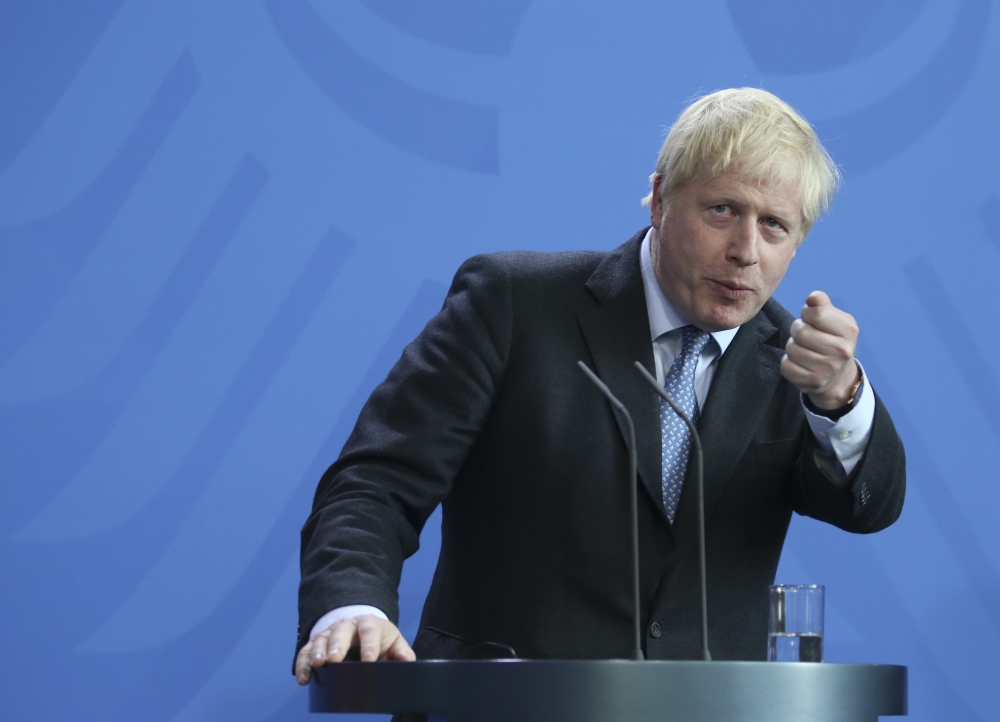 British Prime Minister Boris Johnson makes a speech during a joint press conference with German Chancellor Angela Merkel (not seen) following their meeting in Berlin, Germany on August 21, 2019. (Abdülhamid Ho?ba? - Anadolu Agency)