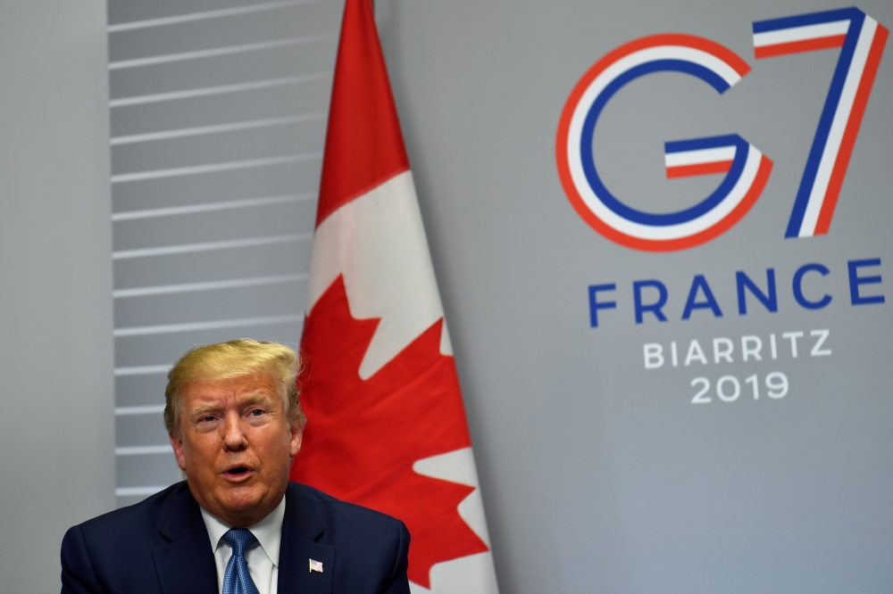 US President Donald Trump (R) speaks during a bilateral meeting with Canada's Prime Minister at the Bellevue centre in Biarritz, south-west France on August 25, 2019. AFP / Nicholas Kamm