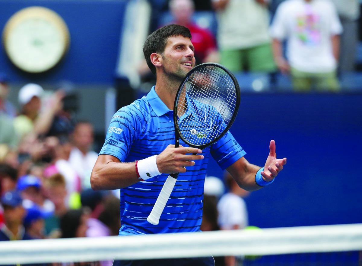 Novak Djokovic of Serbia celebrates match point against Roberto Carballes Baena of Spain in a first round match on day one of the 2019 U.S. Open tennis tournament at USTA Billie Jean King National Tennis Center. Credit: Jerry Lai-USA TODAY Sports
