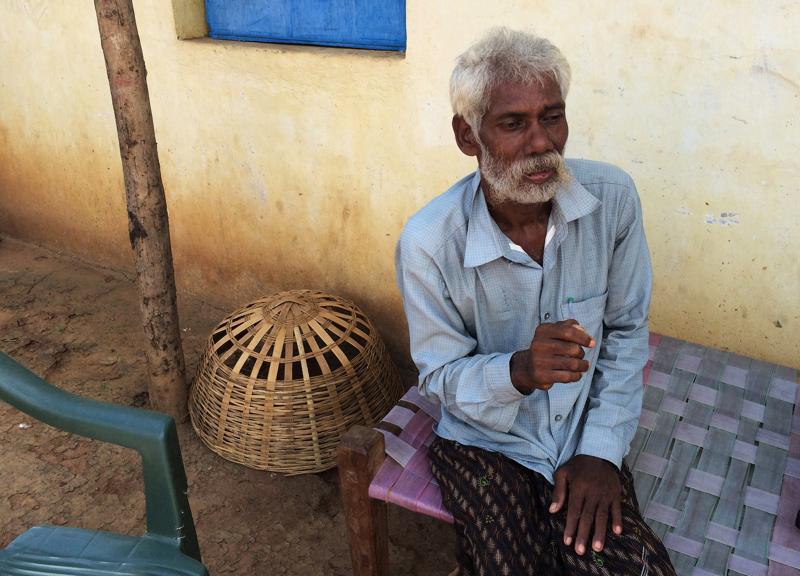 Rescued bonded labourer Srikrushna Rajhansiya recalls his days in bondage outside his home in Sargul village in Odisha. Reuters
