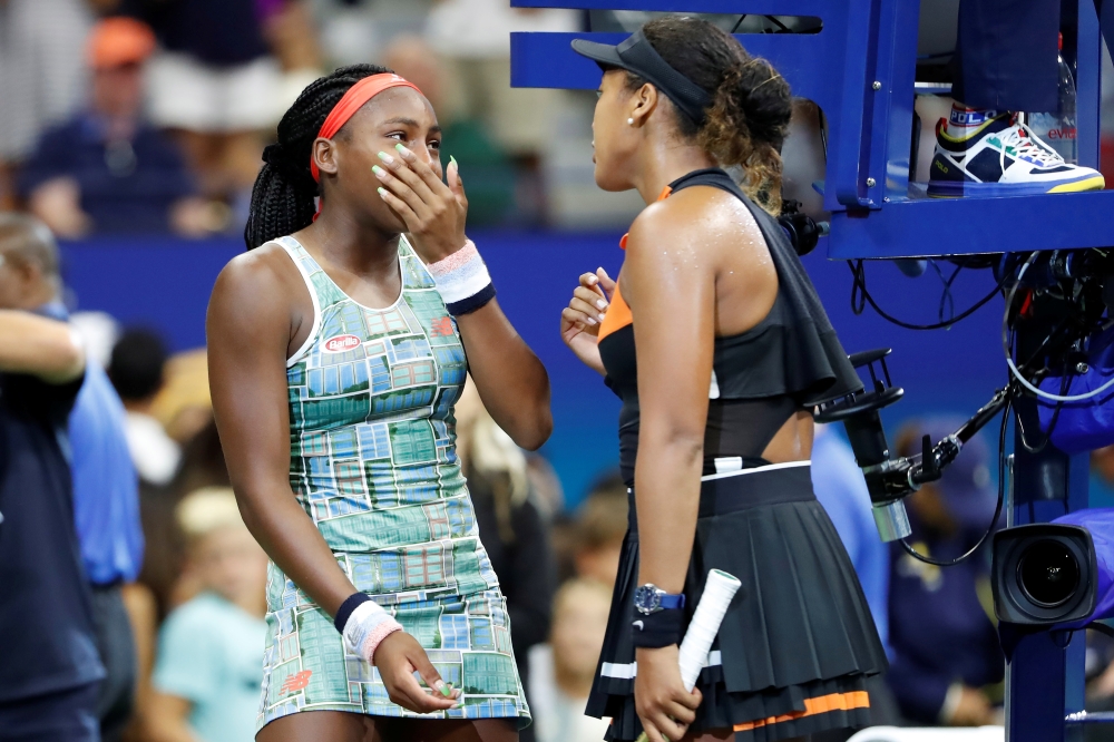 Naomi Osaka of Japan (R) talks with Coco Gauff of the United States (L) after their match in the third round on day six of the 2019 U.S. Open tennis tournament at USTA Billie Jean King National Tennis Center. Geoff Burke-USA TODAY Sports
