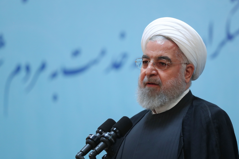 Iranian President Hassan Rouhani makes a speech during the commemoration of former President Mohammad-Ali Rajai in Tehran, Iran on August 28, 2019. (Iranian Presidency / Handout - Anadolu Agency)