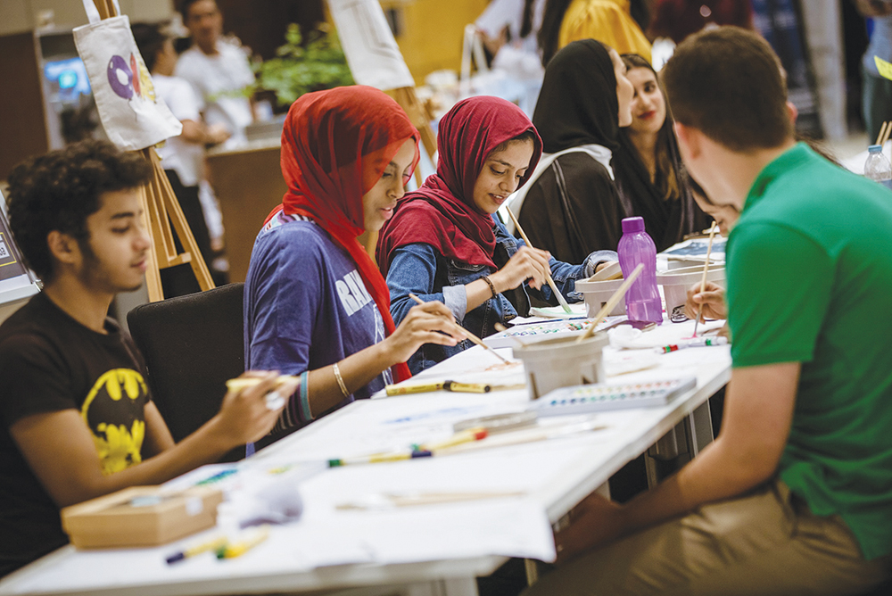 Students engaged in various activities during the orientation event.
