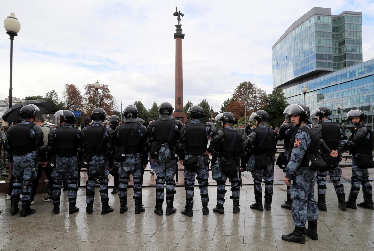Law enforcement officers stand guard during a rally calling for opposition candidates to be registered for elections to Moscow City Duma, the capital's regional parliament, in Moscow, Russia August 3, 2019. REUTERS/Tatyana Makeyeva