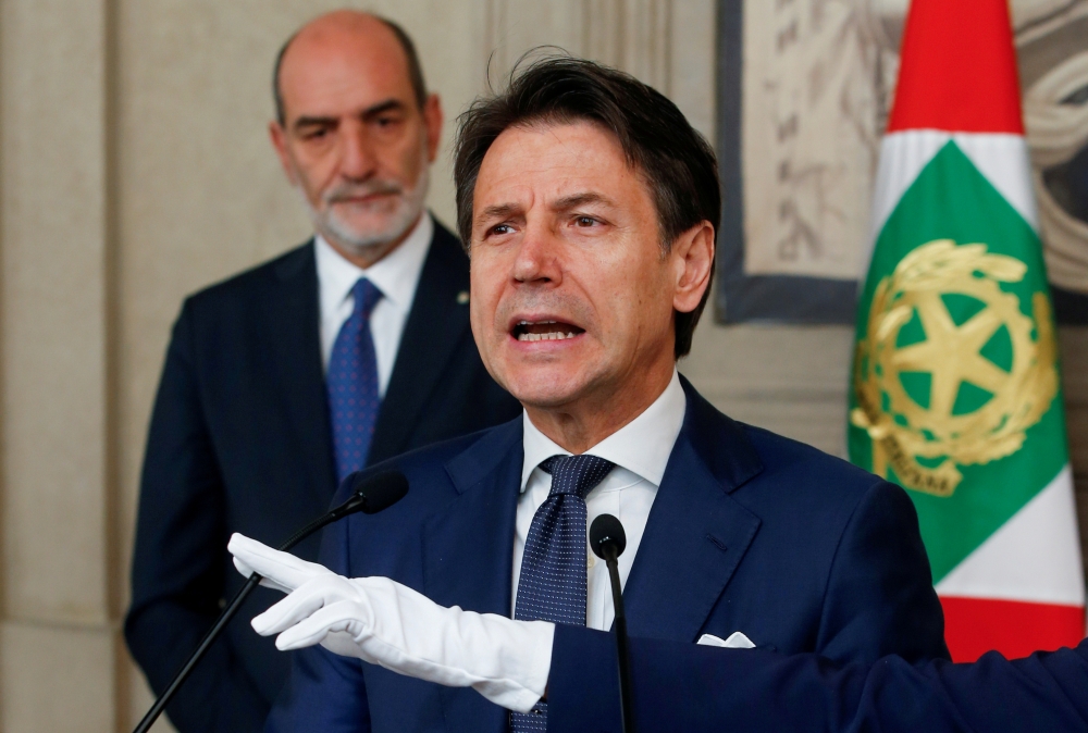 FILE PHOTO: Italian Prime Minister Giuseppe Conte speaks to the media at the Quirinale Presidential Palace after meeting with Italian President Sergio Mattarella in Rome, Italy, August 29, 2019. REUTERS/Ciro de Luca/File Photo