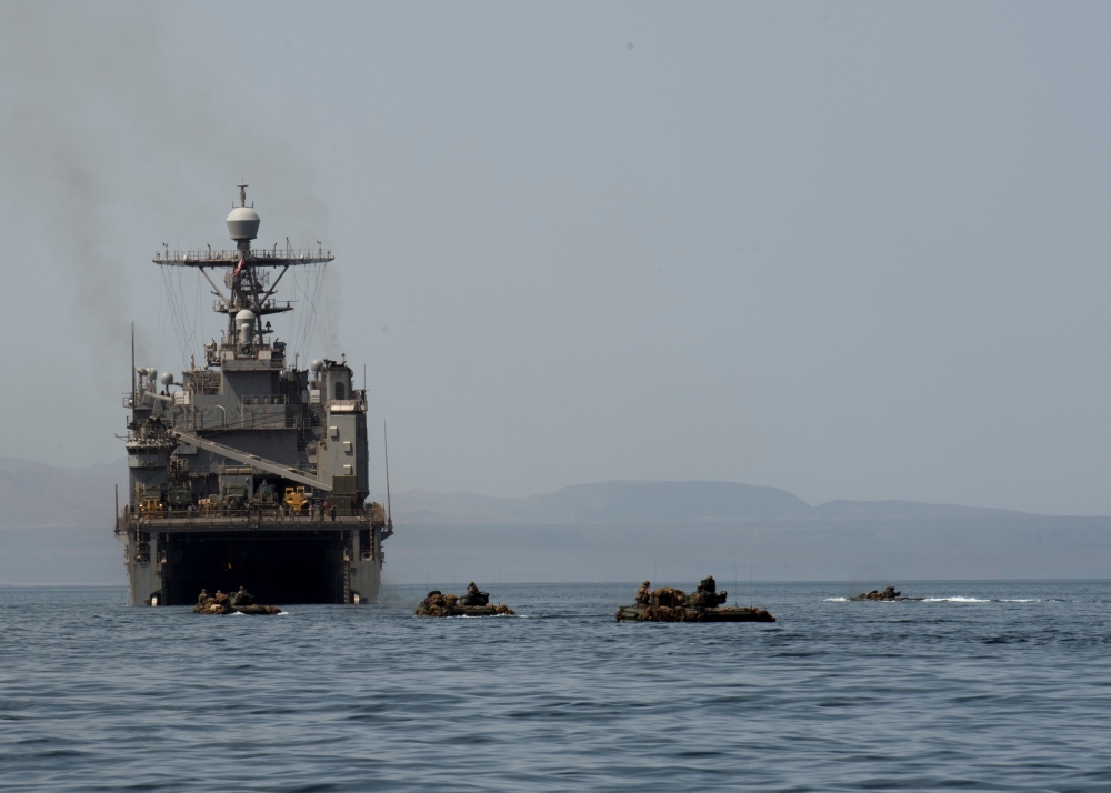 Amphibious Assault Vehicles cruise towards the well deck of the amphibious dock landing ship USS Harpers Ferry (LSD 49), in Gulf of Aden, in this picture released by US Air Force on September 3, 2019. Keypher Strombeck/US Navy/Handout via Reuters
