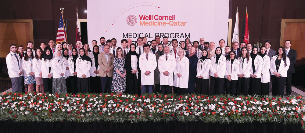 Weill Cornell Medicine–Qatar’s Class of 2023, with Dr. Javaid Sheikh, Dean of WCM-Q (centre), and other faculty members during the White Coat Ceremony 
held on Thursday.