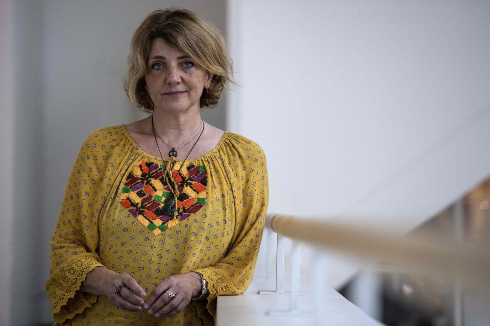 Italian forensic doctor Cristina Cattaneo poses during a photo session in Paris on September 3, 2019. AFP / Christophe Archambault