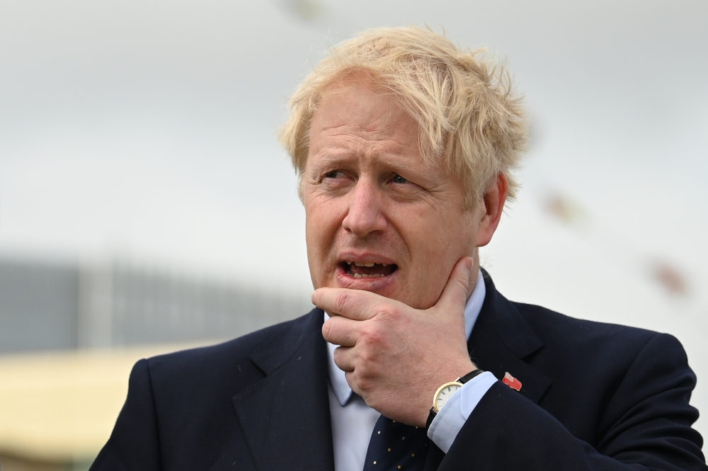 Britain's Prime Minister Boris Johnson visits the NLV Pharos, a lighthouse tender moored on the river Thames to mark London International Shipping Week in London on September 12, 2019. / AFP / POOL / DANIEL LEAL-OLIVAS