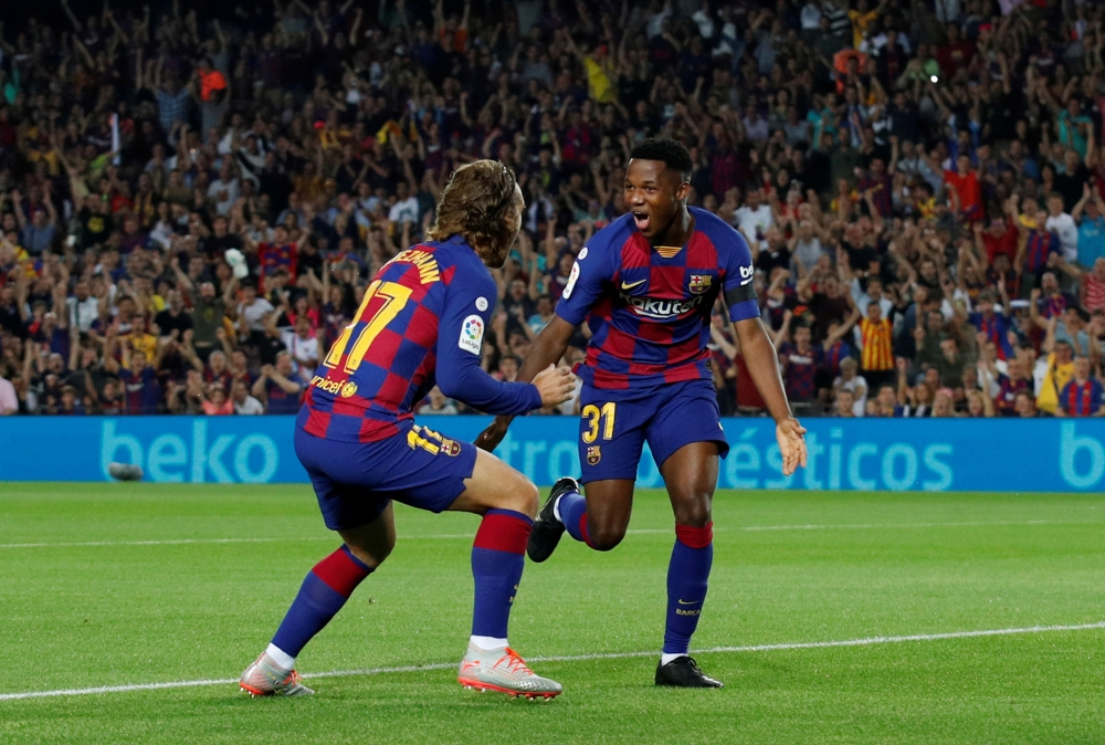 Barcelona's Anssumane Fati celebrates scoring their first goal with Antoine Griezmann REUTERS/Albert Gea TPX IMAGES OF THE DAY