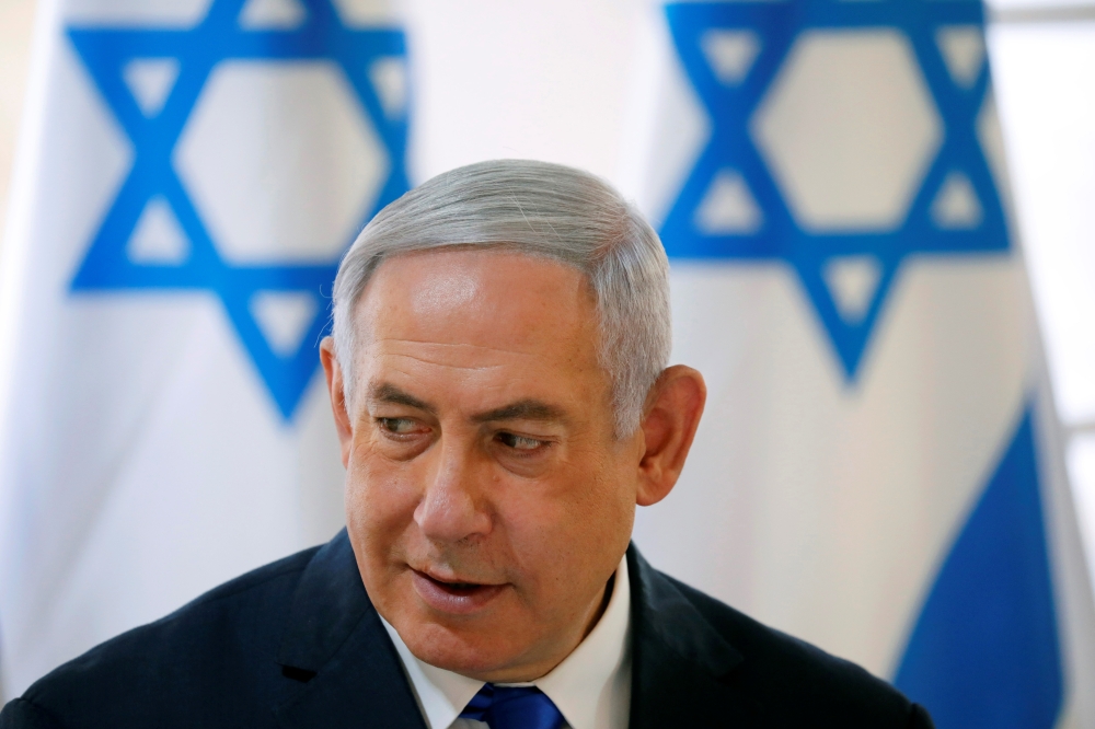 File photo of Israeli Prime Minister Benjamin Netanyahu gestures during a weekly cabinet meeting in the Jordan Valley, in the Israeli-occupied West Bank September 15, 2019. REUTERS/Amir Cohen/File Photo