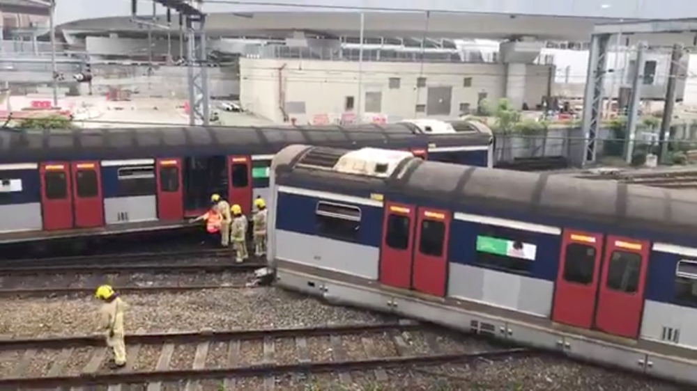 Emergency crew are seen at a derailed train wreckage near Hung Hom station on the MTR East Rail Line following an accident on a train bound for Mong Kok East in Hong Kong, China September 17, 2019 still image taken from a social media video. @SEELIFEHK vi