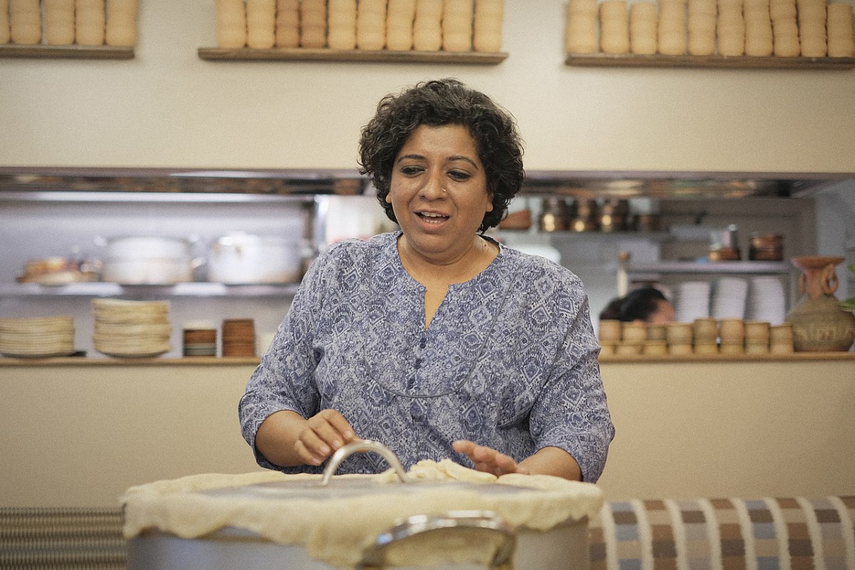 Asma Khan of Darjeeling Express restaurant in London's Soho about to open traditional Calcutta-style dum biryani in this undated photo. Courtesy: Ming Tang-Evans / Wikimedia Commons / CC BY-SA 4.0


 