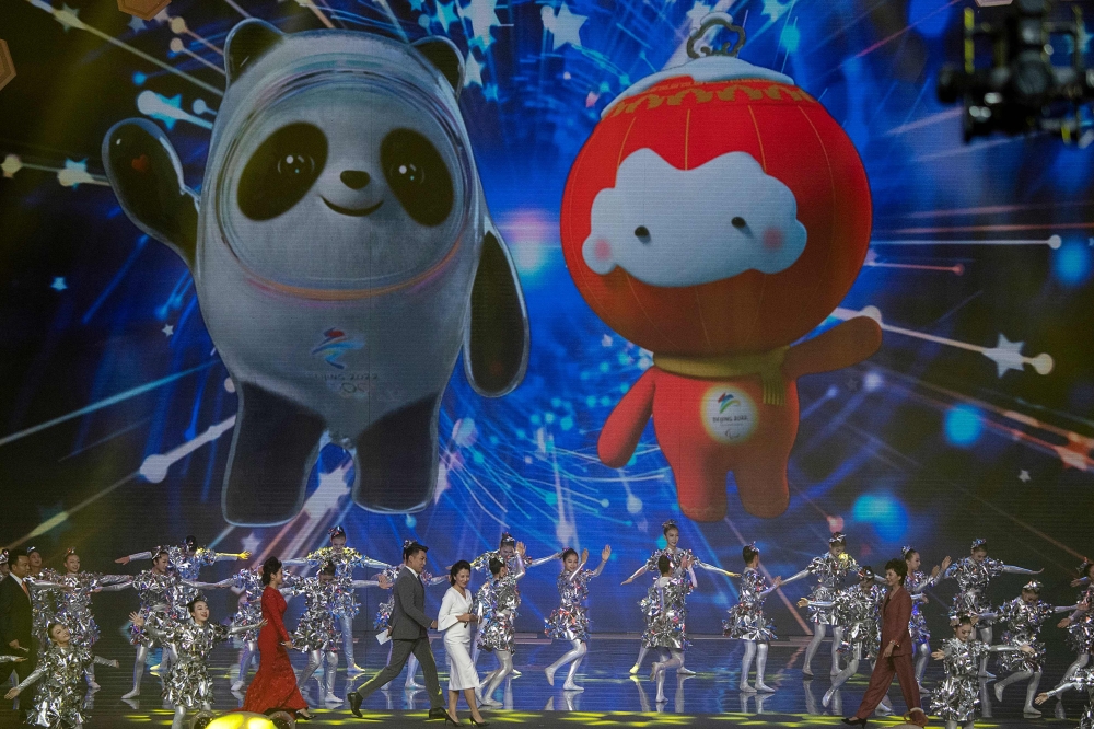 The mascots for the Beijing 2022 Winter Olympic, 'Bing Dwen Dwen' (L), and Paralympic Games, 'Shuey Rhon Rhon' (R), are projected to a screen on the stage during the official reveal of the mascots at Shougang Ice Hockey Arena, Shougang Park, Shijingshan D